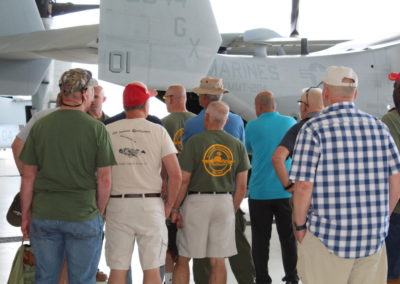 group of people standing with marine helicopter 2D Force Recon 2019 Reunion
